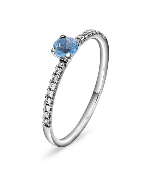 Ring i gull med diamanter 0,10 ct med blå topas